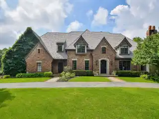 Stately All-Brick Home Framed by Circular Driveway