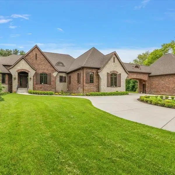 STUNNING CUSTOM RANCH WITH SIX-CAR GARAGE