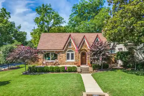 Classic Hollywood Heights Tudor with Modern Upgrades