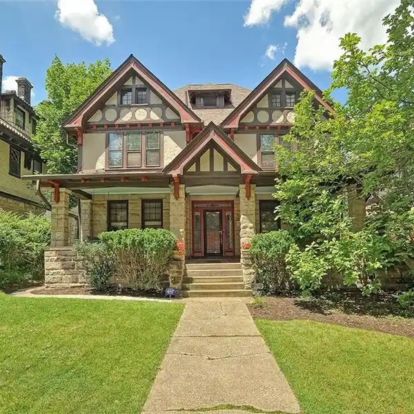 STONE & STUCCO TUDOR RESIDENCE