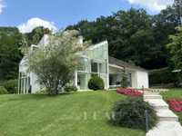BRIGHT AND TASTEFULLY DECORATED PROPERTY IN A PEACEFUL LEAFY ENVIRONMENT