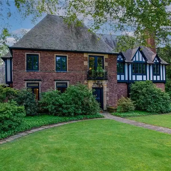 STUNNING BRICK AND STONE TUDOR