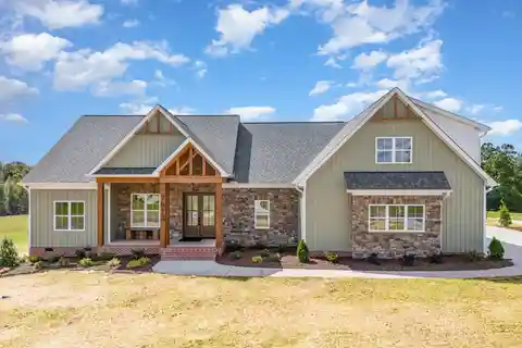 Designer Home with Grand Porch and Luxe Finishes