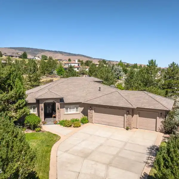 WONDERFUL CUSTOM HOME IN COVETED ARROWCREEK ACRE