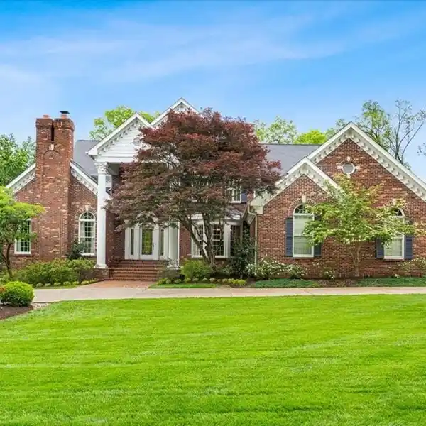 TIMELESS ELEGANCE WITH MODERN COMFORT ON NEARLY 1.5 ACRES