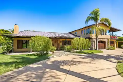 Custom-Built Spanish Contemporary Estate on a Private Acre