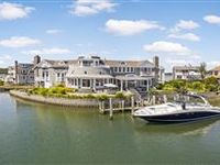 MASTERFUL WATERFRONT STUNNER WITH HIGH-END FEATURES