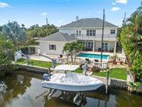 WATERFRONT SIX-BEDROOM HOME ON DEEP WATER CANAL
