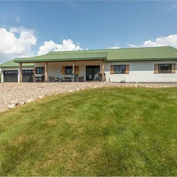 LUXURY COUNTRY LIVING WITH HEATED BARNS AND SHOP
