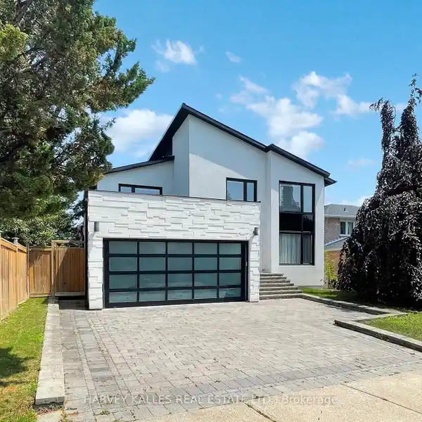 EXQUISITE CUSTOM HOME WITH PREMIUM UPGRADES