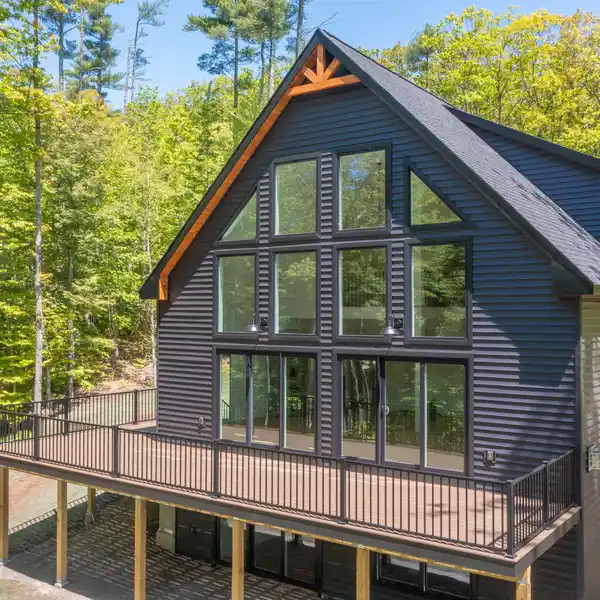 CUSTOM-BUILT HOME WITH SEASONAL LAKE VIEWS