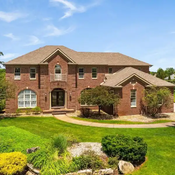 ELEGANT BRICK HOME WITH SPECTACULAR LAKE VIEWS