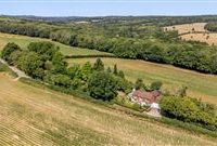 CHARMING COTTAGE-STYLE HOME WITH STUNNING VIEWS IN A WONDERFUL RURAL SETTING