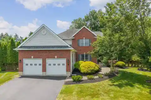 Elegant Colonial with Covered Porch and Deck