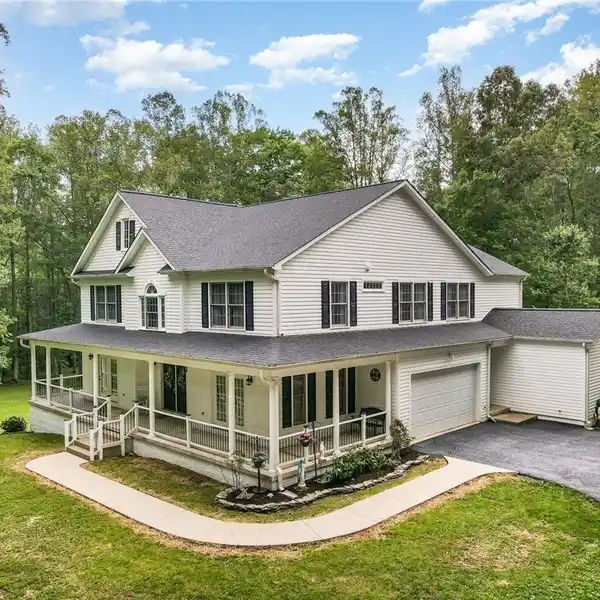 ELEGANT 11+ ACRE RETREAT WITH SPACIOUS DECK