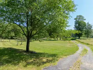 Cedar-Sided Traditional Home on 23 Acres