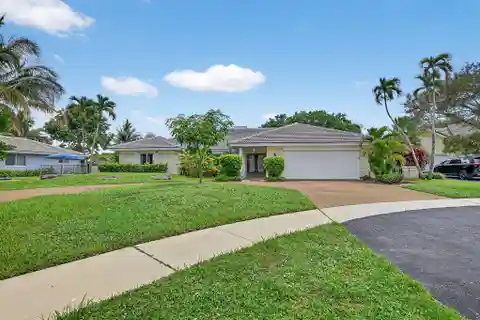 Boca Raton Gated Pool Home with Canal Views