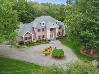 Exquisite Brick Colonial with Luxurious Upgrades