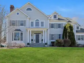 Amazing Center Hall Colonial on over Two Acres