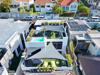 Designer Retreat with Rooftop Pool and Sea Views