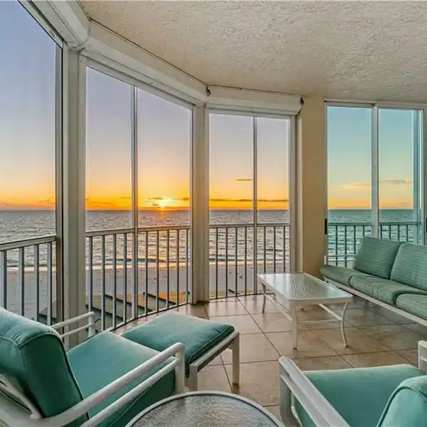 BEACHFRONT END-UNIT IN COVETED BAREFOOT BEACH CLUB