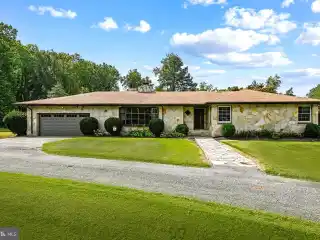 Rancher with Detached Apartment on Nearly Four Acres