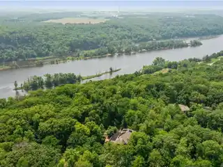 Sophistication and Natural Tranquility on Five Wooded Acres