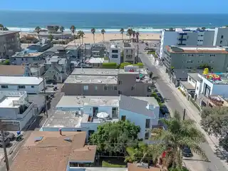 Architectural Coastal Home Just Moments to the Sand