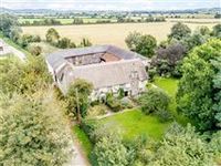 A CHARMING THATCHED HOME SET IN 1.9 ACRES WITHIN THE POPULAR EXE VALLEY LOCATION