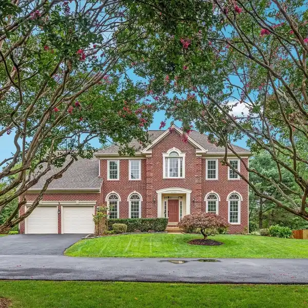 CHARMING BRICK-FRONT COLONIAL ON A PRIVATE LOT