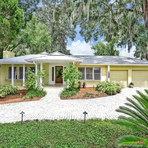 SINGLE-STORY KEY WEST-STYLE POOL HOME
