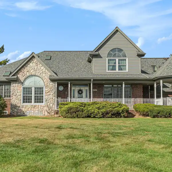 PRIVATE ESTATE LIVING WITH EXPANSIVE ACREAGE AND ELEGANCE