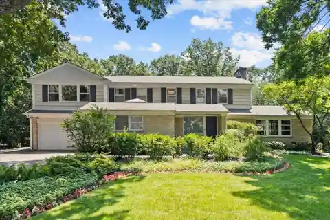 Sunlit Colonial in a Prime Braeside Location