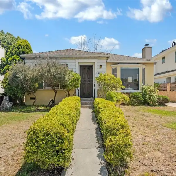 CHARMING HOME WITH TREMENDOUS POTENTIAL