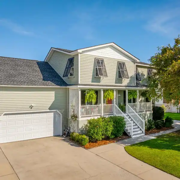 A TRULY TURN-KEY EXPERIENCE ON A QUIET, LUSH LOT