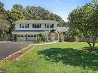 Beautifully Updated and Expanded Colonial Home