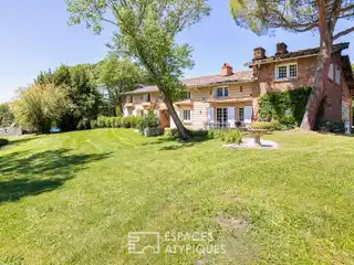 Elegant 1850 Farmhouse on Lush Parkland