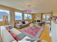 ELEGANT PENTHOUSE APARTMENT WITH A VIEW OF LAKE LUGANO