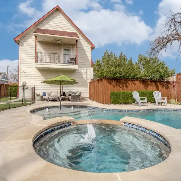 UPGRADED HOME WITH BACKYARD OASIS