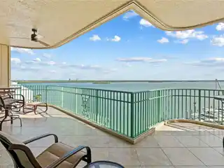 Higher-Floor End Unit with Unrivaled River and Gulf Views