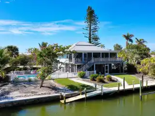 Elevated Canal-front Pool Home