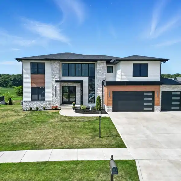 CUSTOM HOME WITH PEACEFUL MEADOW VIEWS
