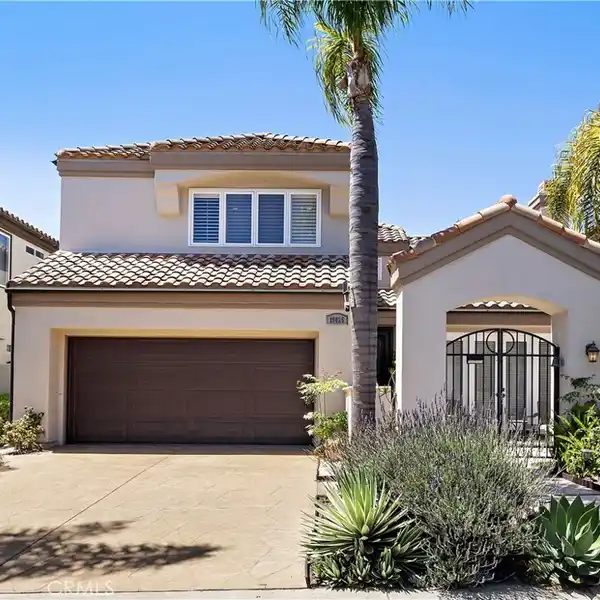 HIGHLY UPGRADED HOME IN AN EXCLUSIVE GATED COMMUNITY