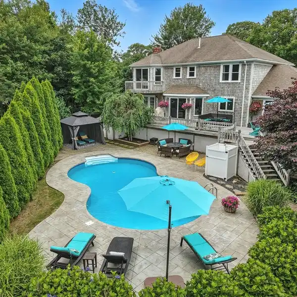 IDYLLIC SHINGLE-STYLE COLONIAL IN OLD REXHAME