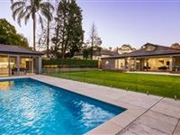 STUNNING HOME WITH PROFESSIONALLY LANDSCAPED MANICURED GARDENS