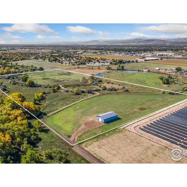 EXPANSIVE ACREAGE WITH POND AND MOUNTAIN VIEWS