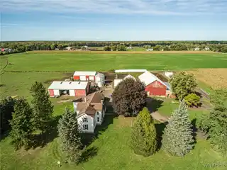 Charming Farmhouse Plus Multiple Barns on Ten Acres