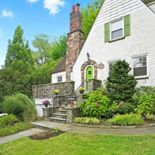 STORYBOOK VILLAGE TUDOR IN A PRIME LOCATION