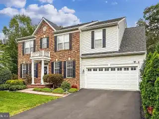 Impeccable Brick-Front Colonial in Prime Location