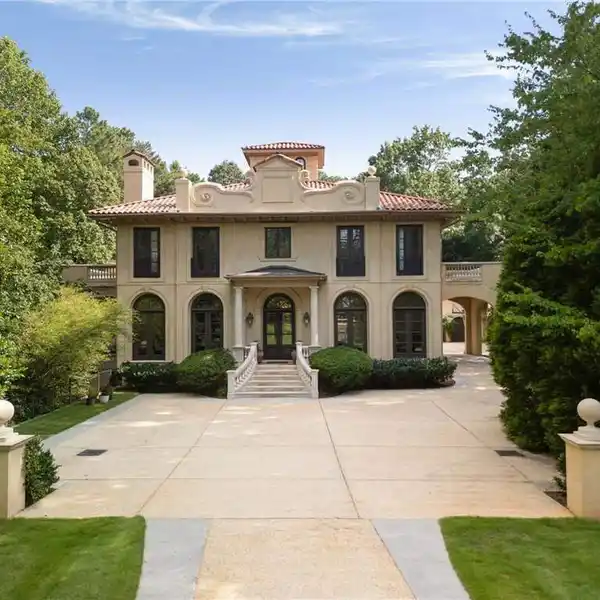 EUROPEAN-STYLE HOME ON 1.7 GATED ACRES
